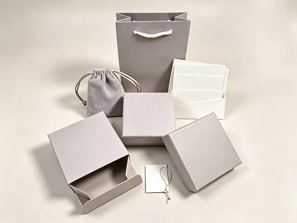 Custom rigid gift boxes and paper packaging with emboss foil printing for brand gifting MEBENNA